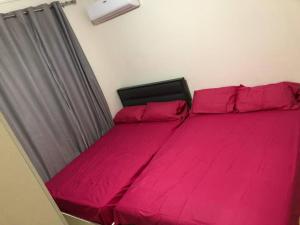 A bed or beds in a room at Amazing Chalet at Bluebay Asian Resort Pool View - Families Only
