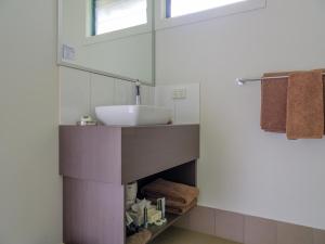 a bathroom with a sink and a mirror at The Station at El Questro in Kununurra