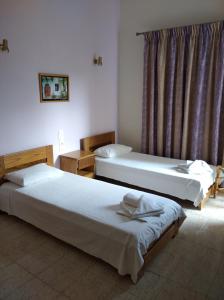 Postel nebo postele na pokoji v ubytování Hotel Ion + 37 fotografií