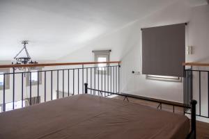 a room with a large projection screen on the wall at Sivota Apartment in Syvota