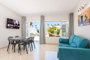 TV a/nebo společenská místnost v ubytování Haciendas Village Tenerife