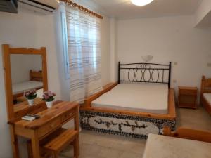 Stavros Beach Villas房間的床