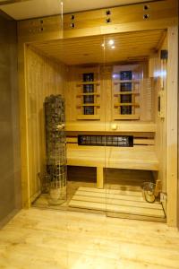a room with a sauna with a glass wall at Rent like home - Ubocz 1D in Zakopane