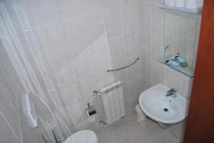 Koupelna v ubytování Hotel Il Chierichetto