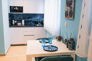 Televízia a/alebo spoločenská miestnosť v ubytovaní The Place Apartments Hebrangova
