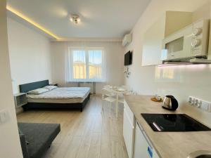 Łóżko lub łóżka w pokoju w obiekcie Center Warsaw- Apartamenty Smolna