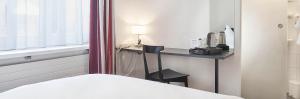 Katil atau katil-katil dalam bilik di Hotel Hottingen