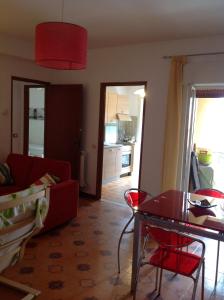 Posedenie v ubytovaní Apartment in Patti Marina: a step away from the sea and from the center!