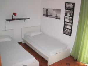 Posteľ alebo postele v izbe v ubytovaní Apartment in Patti Marina: a step away from the sea and from the center!