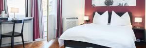 Katil atau katil-katil dalam bilik di Hotel Hottingen
