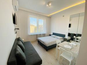 Łóżko lub łóżka w pokoju w obiekcie Center Warsaw- Apartamenty Smolna