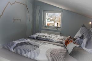 Postel nebo postele na pokoji v ubytování Ferienhaus Fux