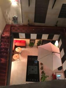 an overhead view of a living room with a couch at Riad JEREMY in Marrakech