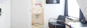 TV a/nebo společenská místnost v ubytování Hotel Hottingen