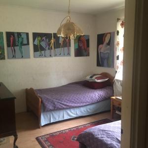 Postel nebo postele na pokoji v ubytování Arthome Småland