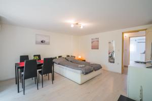 Posteľ alebo postele v izbe v ubytovaní Zigzag Apartman