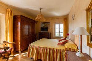 A bed or beds in a room at Agriturismo Percenna