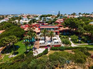 an aerial view of a resort with palm trees at Boutique Hotel Vivenda Miranda in Lagos