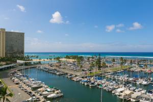 an aerial view of a marina with boats in the water at Spacious One Bedroom Harbor View Condos at Ilikai Marina With Private Balcony in Honolulu