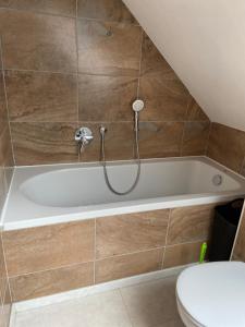 Ein Badezimmer in der Unterkunft Casa Andrea 4 Zimmer Wohnung