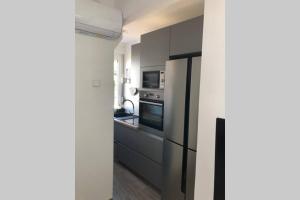 Dapur atau dapur kecil di APARTMAN BONBON