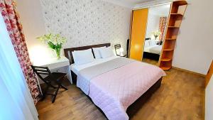 Ліжко або ліжка в номері Квартира с видом на Белую беседку Сеть апартаментов в центре Alex Apartmets Бесконтактное заселение 24-7