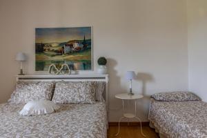 A bed or beds in a room at Agriturismo Percenna