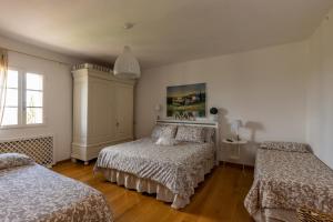 A bed or beds in a room at Agriturismo Percenna