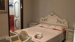 Postel nebo postele na pokoji v ubytování Casa Himera Fontane Bianche + 27 fotografií