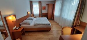 Postel nebo postele na pokoji v ubytování Schillers Landhaus
