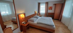 Postel nebo postele na pokoji v ubytování Schillers Landhaus