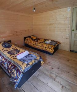 Katil atau katil-katil dalam bilik di Guesthouse Pirimze