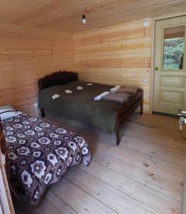 Katil atau katil-katil dalam bilik di Guesthouse Pirimze