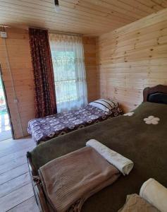 Postel nebo postele na pokoji v ubytování Guesthouse Pirimze
