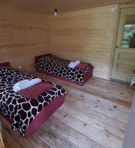 Katil atau katil-katil dalam bilik di Guesthouse Pirimze
