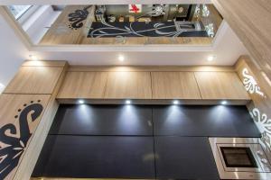 Kuchyňa alebo kuchynka v ubytovaní ApartHost Jagiellońska Residence