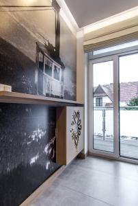 Kuchyňa alebo kuchynka v ubytovaní ApartHost Jagiellońska Residence