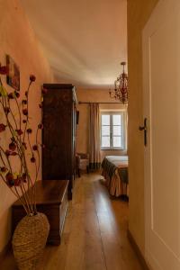 A bed or beds in a room at Agriturismo Percenna