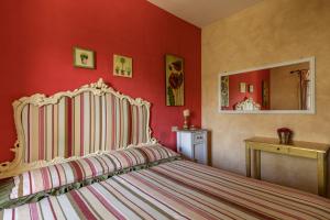 A bed or beds in a room at Agriturismo Percenna