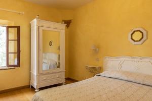 A bed or beds in a room at Agriturismo Percenna
