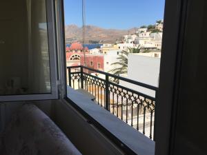 A balcony or terrace at Platanos Rooms