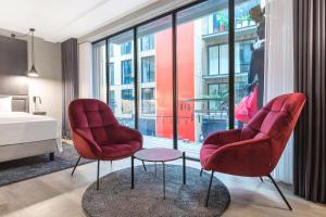 Radisson RED Aarhus客房内的一张或多张床位