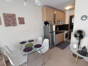 Kuchyňa alebo kuchynka v ubytovaní Iris Deluxe Suites 1