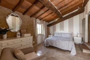 Postel nebo postele na pokoji v ubytování Agriturismo Percenna