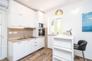 Gallery image of Corallium Blue in Pomena