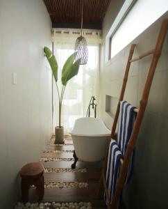 Koupelna v ubytování Ahana Resort El Nido
