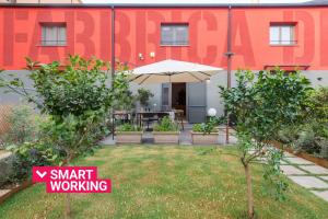 Zahrada ubytování Casa con giardino all'ex Fabbrica di Pomodoro + 9 fotografií