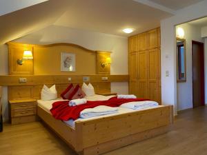 Postel nebo postele na pokoji v ubytování Hotel Berghof