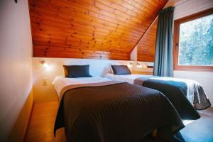 Postelja oz. postelje v sobi nastanitve Val d'Arimont Resort