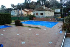 Bazén v ubytovaní Apartamento con Terraza y Piscina, Baiona alebo v jeho blízkosti